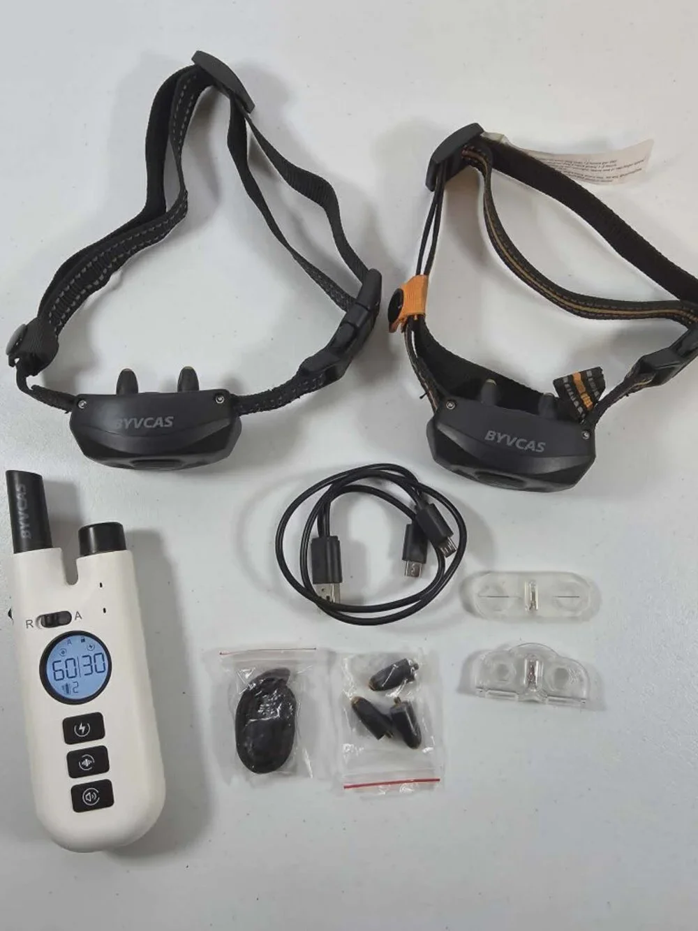 DOG TRAINING BARK COLLARS WITH REMOTE BYVCAS DUAL ACTION USED ONCE